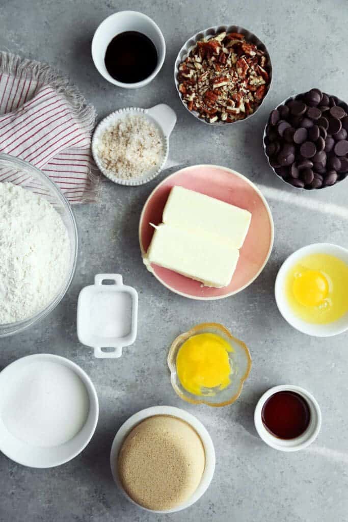 Ingredients for brown butter chocolate chip cookies in small bowls.
