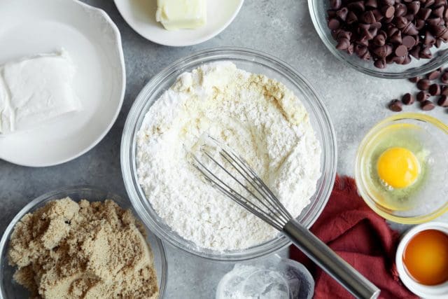Dry ingredients for cookie batter whisked together in a medium bowl.