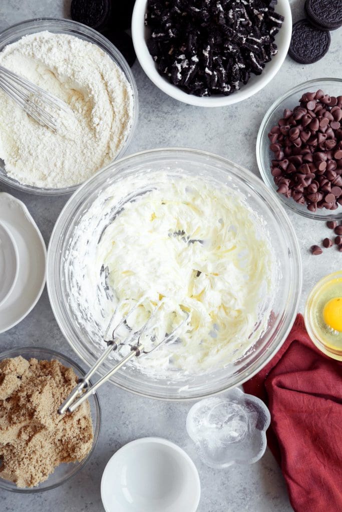 Softened butter and cream cheese whipped together in a bowl.
