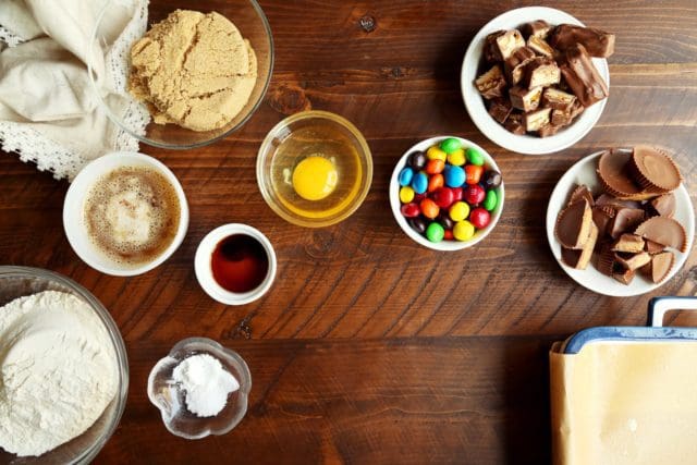 ingredients in small bowls for candy bar blondies