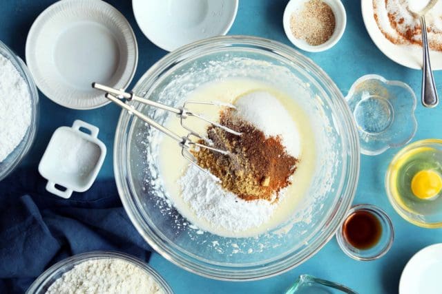 Spices and oil in a bowl for cookie dough.