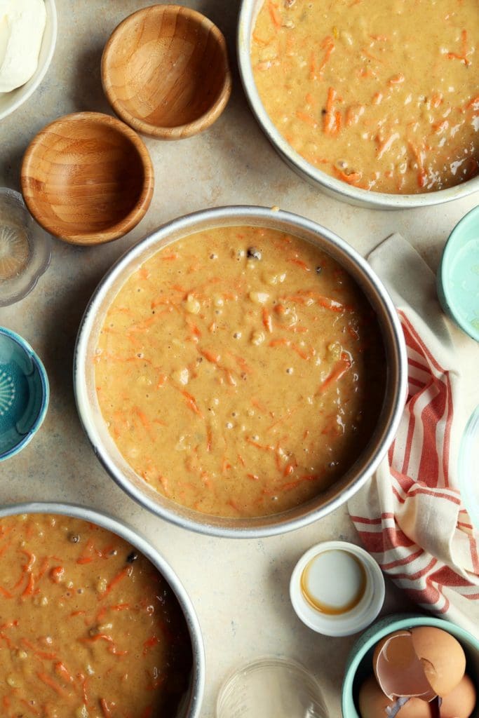 Carrot cake recipe batter in 9-inch round pans.