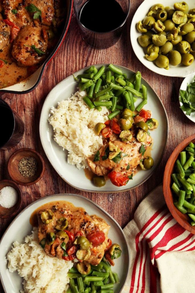 Marry me chicken plated with rice and green beans for dinner.