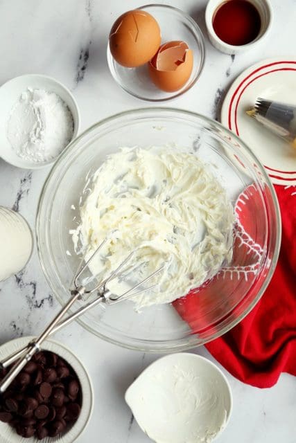 Whipped cream cheese in a small bowl.