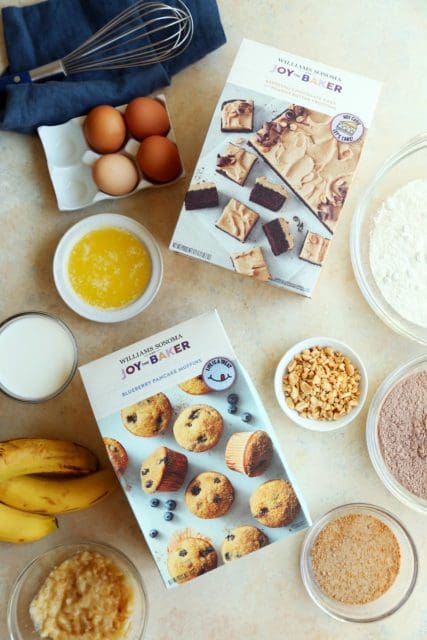 Cake mixes and ingredients on counter for baking.