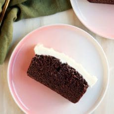 Slice of Chocolate Guinness Cake on a small pink plate
