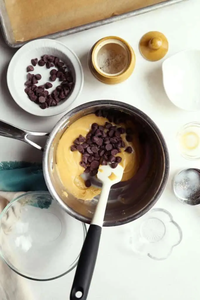 Stirring chocolate into cookie dough