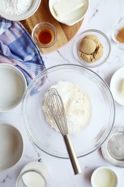 dry ingredients for small batch cinnamon rolls in small bowl