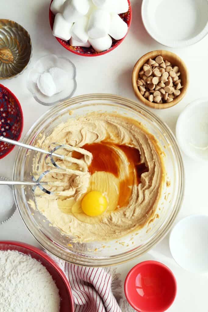 Eggs and vanilla added to fluffernutter cookie recipe bowl.