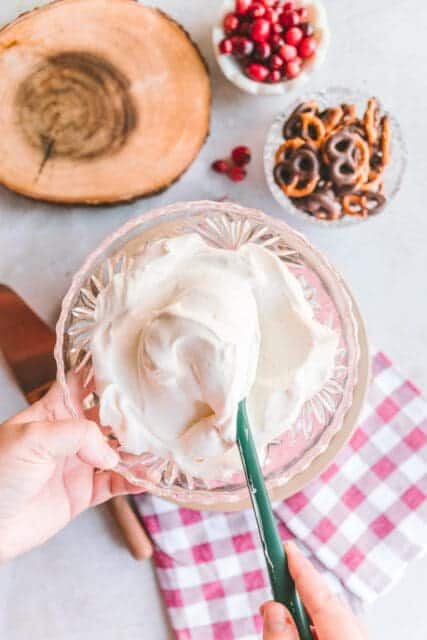 Bowl of soft whipped cream.