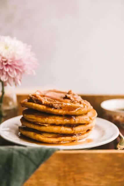 stack of sweet potato pancakes on a small plate