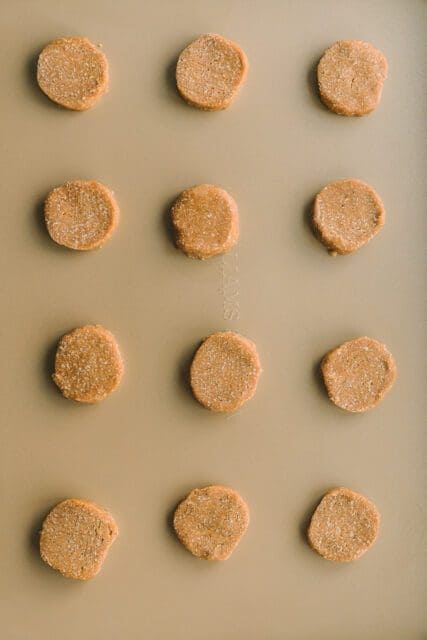 Oatmeal cookie dough on a baking sheet.