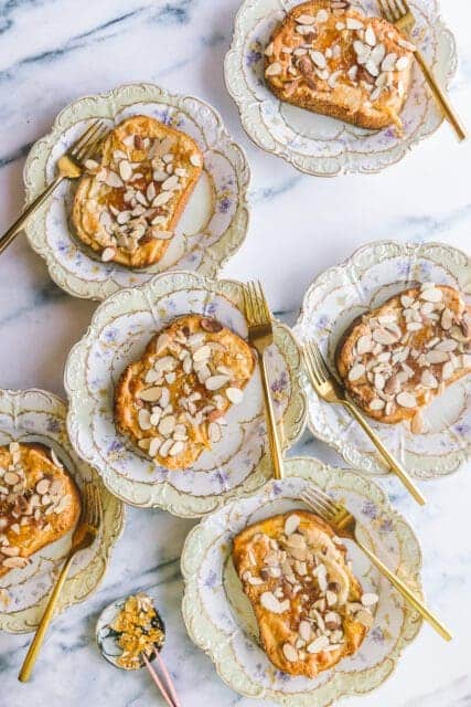 overhead shot of Mardi Gras toast on individual vintage plates