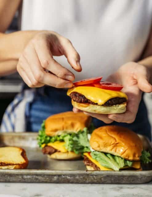 assembling finished root beer smash burgers