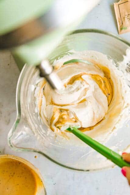 gently folding together ingredients for coffee ice cream