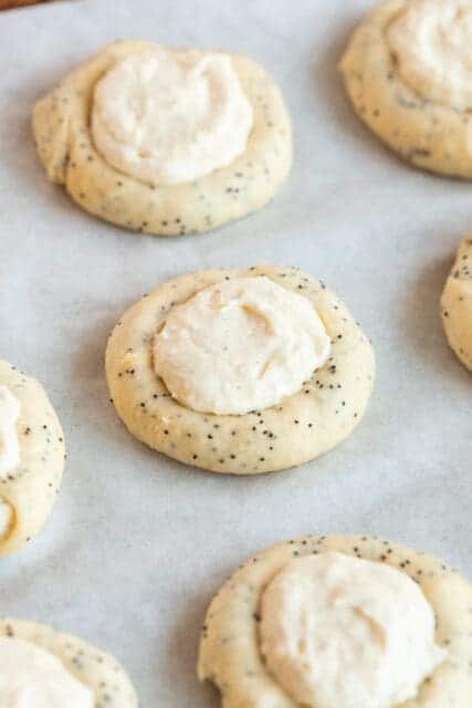 delicious kolache recipe filled with cream cheese mixture on top of lemon curd