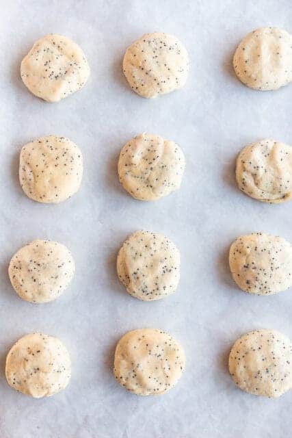 unbaked kolaches rising on a pan