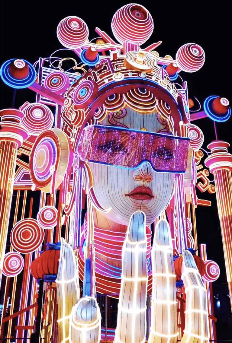 Colossal Lantern glowing at the Zigong Lantern Festival, featuring intricate designs and stunning illuminated figures.