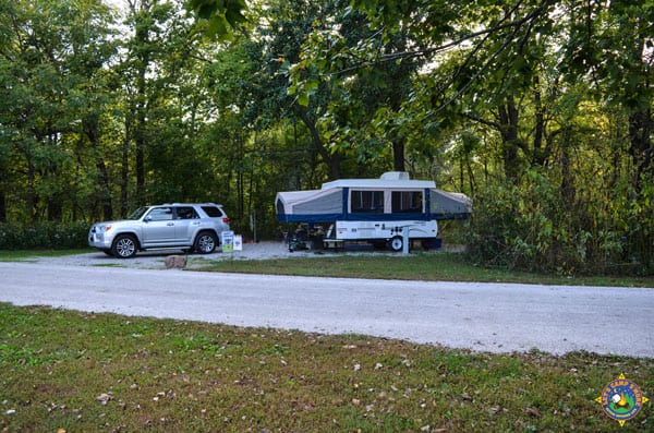 campsite with a pop-up camper trailer
