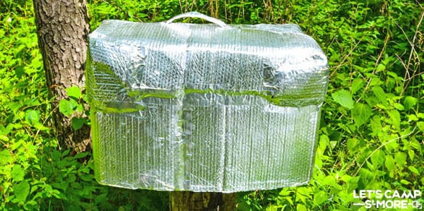 silver thermal cover over an ice chest