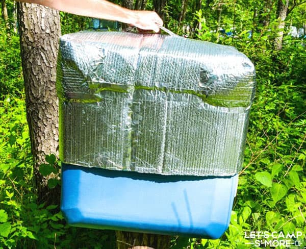 cover being pulled off an ice chest