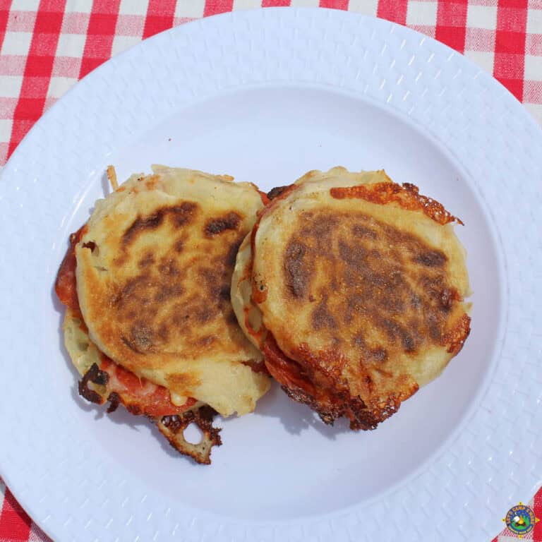 two perfectly grilled pizza sandwiches