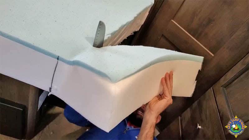 cutting a memory foam to create a custom RV mattress