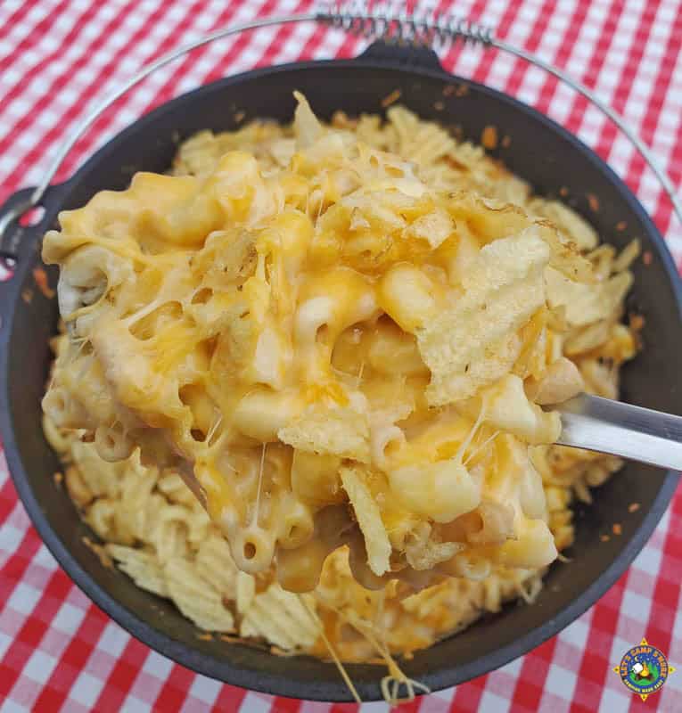 close up of a some macaroni and cheese on a serving spoon