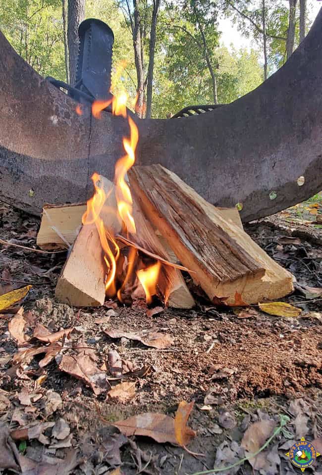 campfire being started by a cardboard fire starter