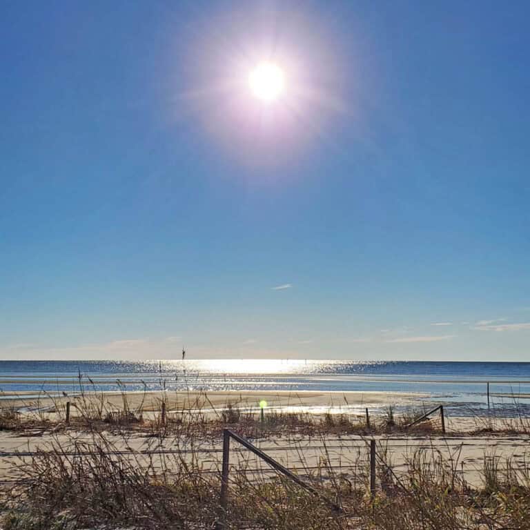 sun shining over the beach in Waveland Mississippi