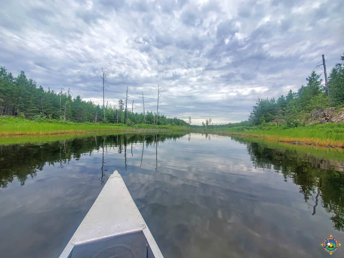 reflections in glassy water on a lake in Minnesota