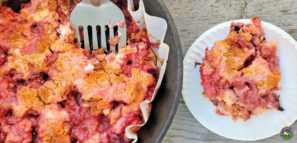 Fresh Strawberries Cream Cheese Dump Cake in a Dutch Oven
