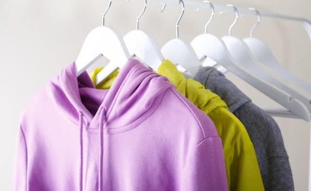 Sports clothes hanging on a rack