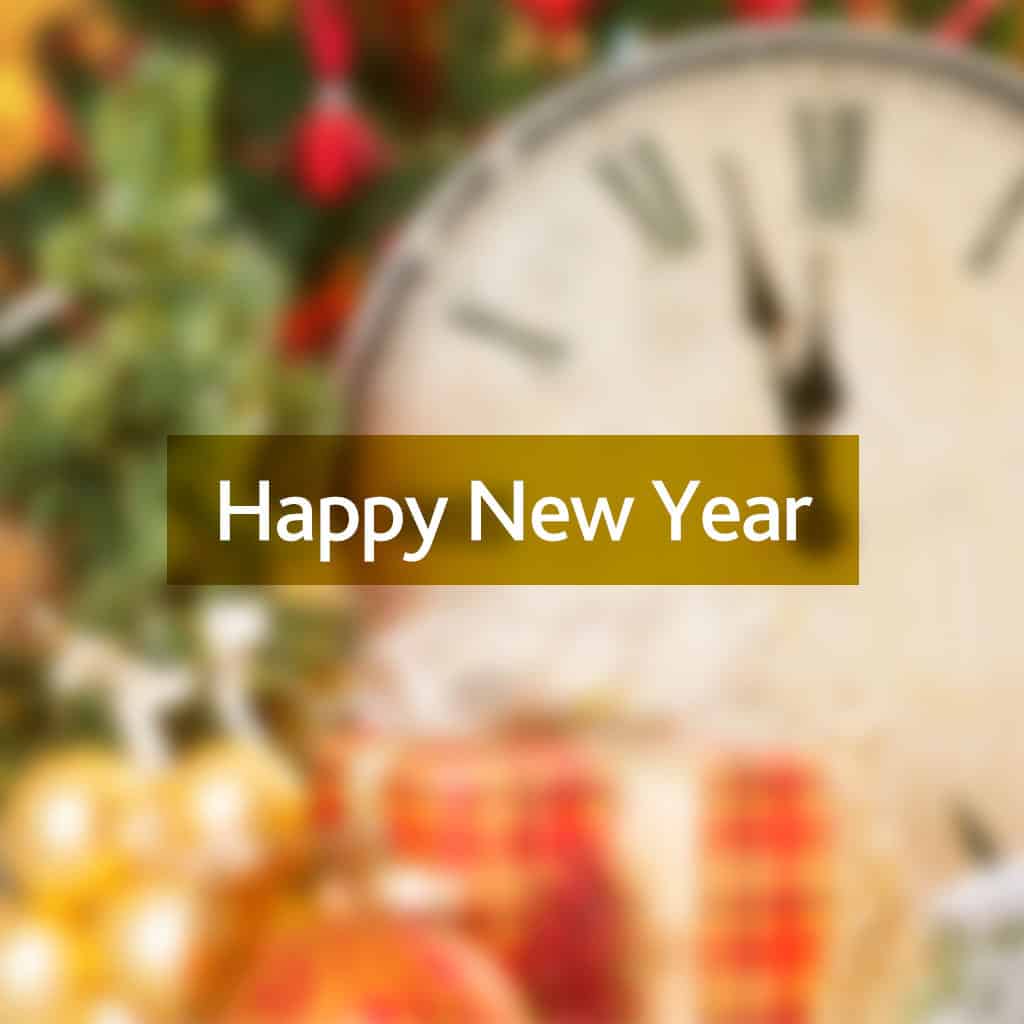 Happy New Year message on a blurred New Year background with a clock