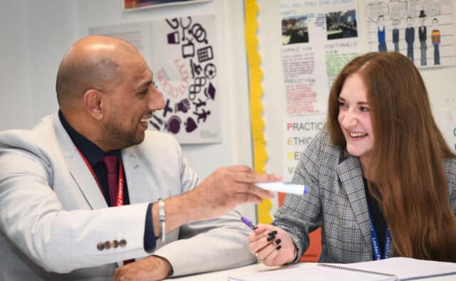 Landau Forte Academy Tamworth Sixth Form teacher talking with student