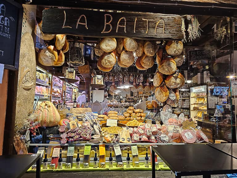 A variety of local delicacies, cheeses, and cured meats at Bologna’s Quadrilatero Market.