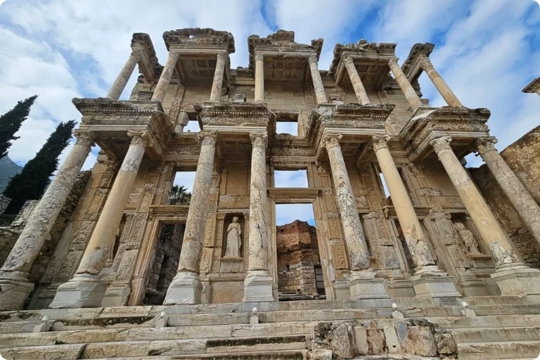 Close-up view of the Library of Celsus in Ephesus, Turkey, showcasing its ornate Corinthian columns, detailed carvings, and grand architecture from the Roman era.