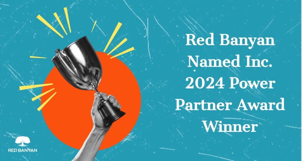 Hand holding a trophy with fun graphics around it announcing Red Banyan's 2024 Inc. Power Partner Award