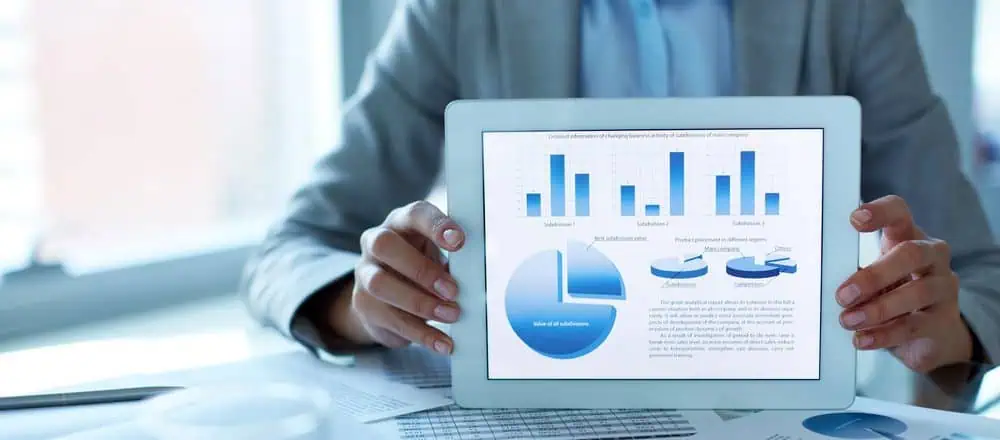 Financial advisor showing  someone's financial situation on a screen