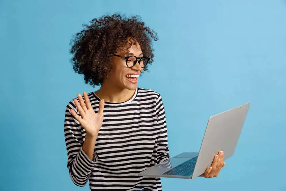 Woman coaching a client online