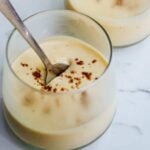 Vegan eggnog pudding in a glass.
