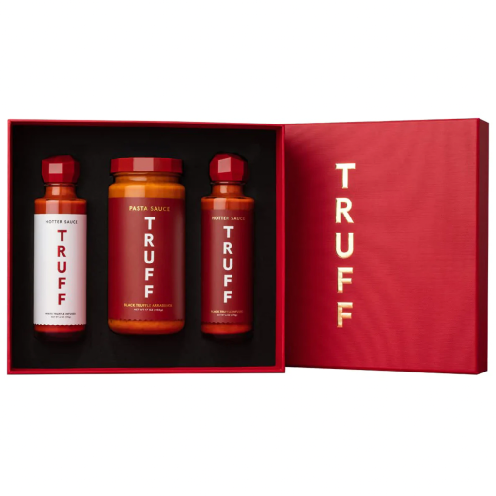 A red gift box with 3 spicy truffle TRUFF sauces inside.
