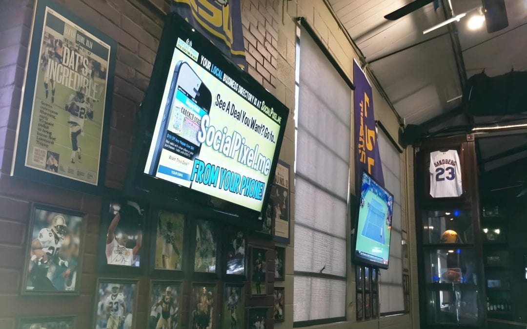 display advertising on brick wall