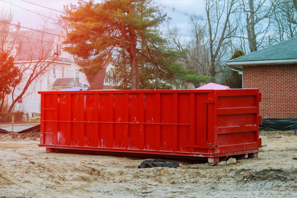 Rear Load Dumpster Repairs: Restoring Hinges and Doors