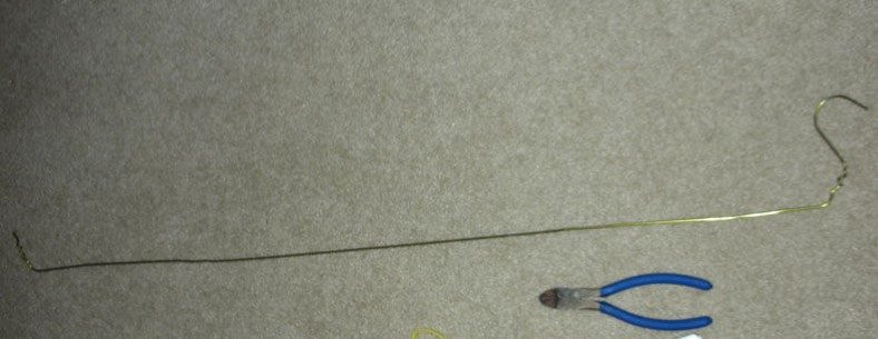 Image of straightened coat hanger