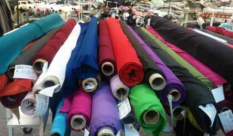 Image of a fabric store discount table