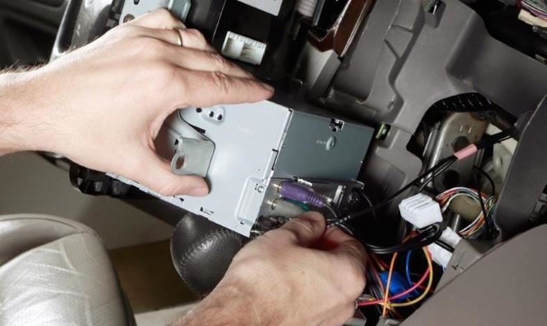Example of connecting RCA cables to rear of a car stereo