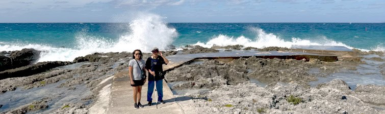 Posing in front of Grand Cayman coastal spray