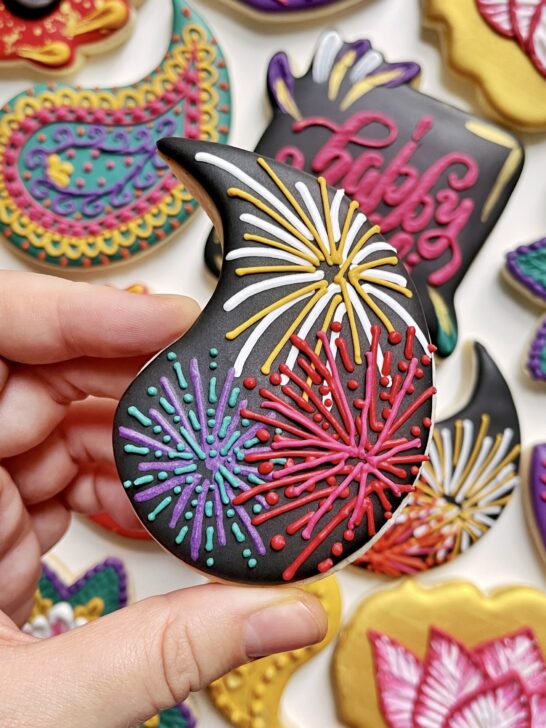 fireworks cookie decorated with black royal icing