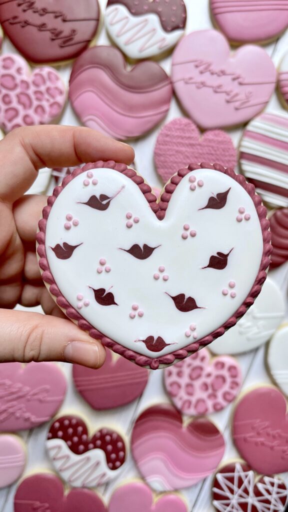 heart cookie decorated with royal icing 